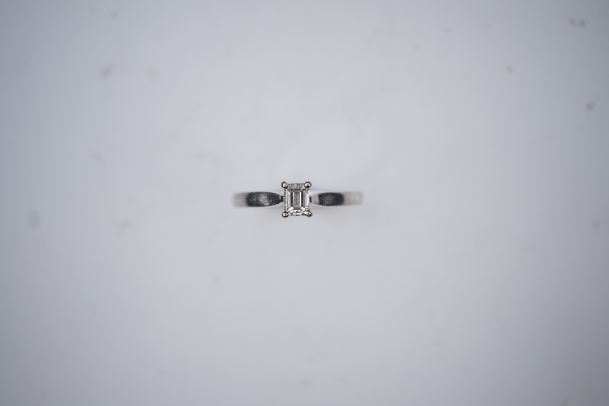 A diamond solitaire ring